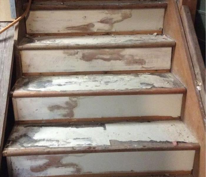 Wood stairs suffering from the effects of fire damage